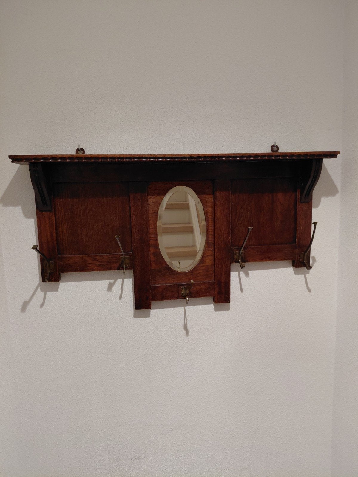 Antieke houten kapstok met spiegel en messingng haken, Ophalen