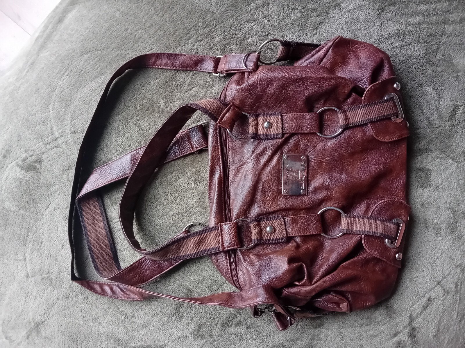 Bruine schoudertas/rugzak met ringdetails, Overige merken, Gebruikt, 25 tot 40 cm, Ophalen of Verzenden