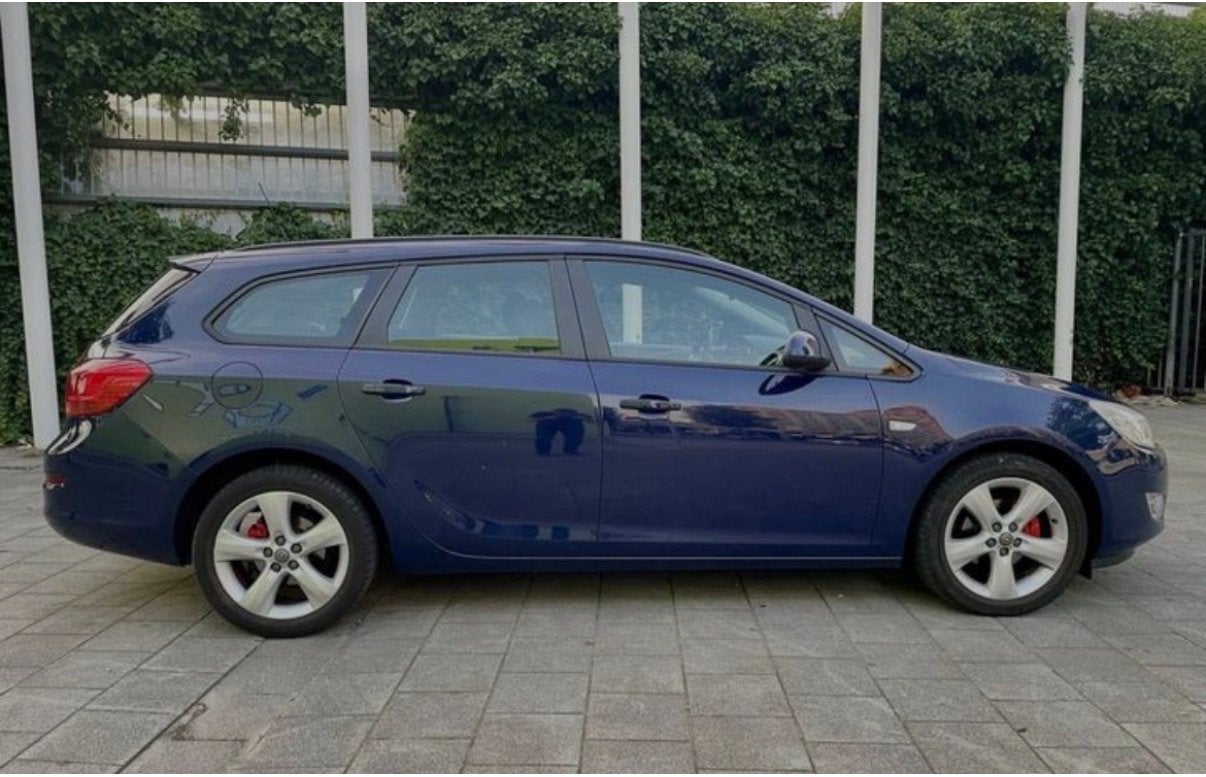 Opel Astra 1.4 74KW ST 2011 Blauw, Auto's, Voorwielaandrijving, 4 cilinders, Blauw, 100 pk