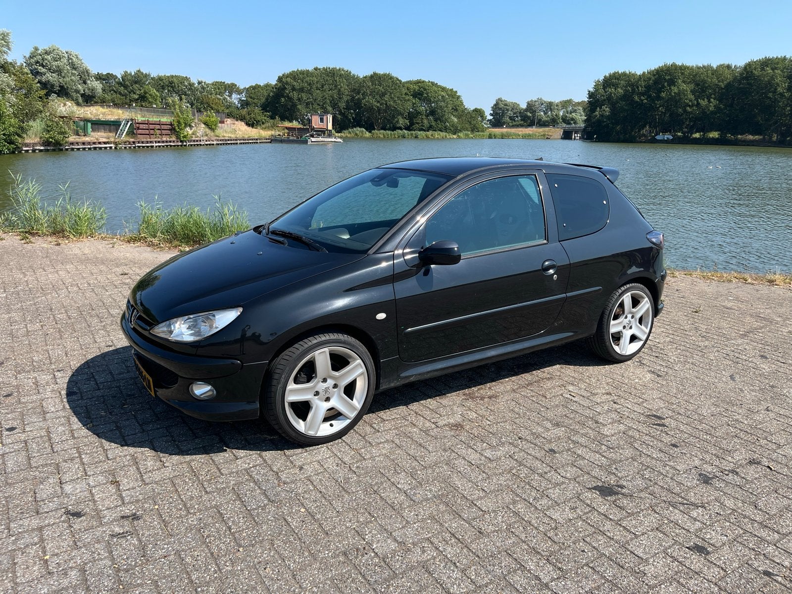 Peugeot 206 RC 180pk 149.000km!, Auto's, Voorwielaandrijving, Zwart, 4 stoelen, Leder en Stof