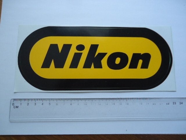sticker oud NIKON GROOT logo plastic formule 1 f-1 f1 camera, Verzamelen, Verzenden, Zo goed als nieuw, Bedrijf of Vereniging