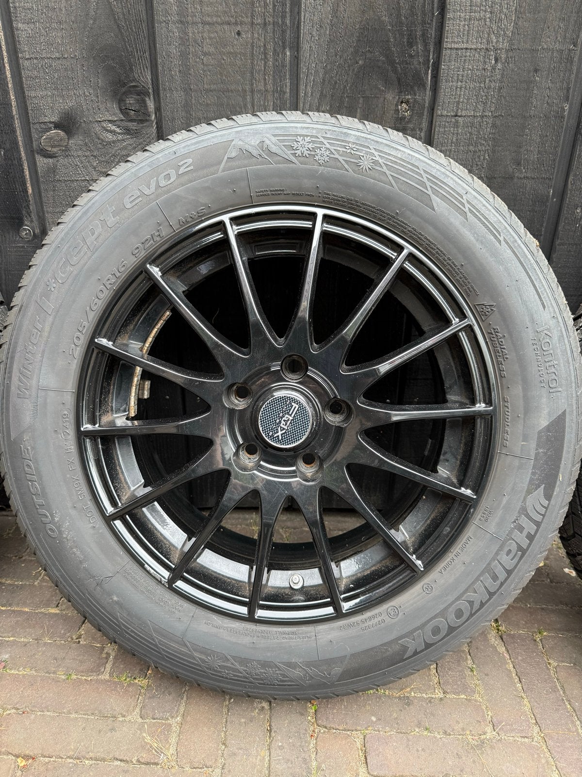 Zwarte lichtmetalen velgen met winterbanden, Ophalen, Gebruikt, 16 inch, Banden en Velgen