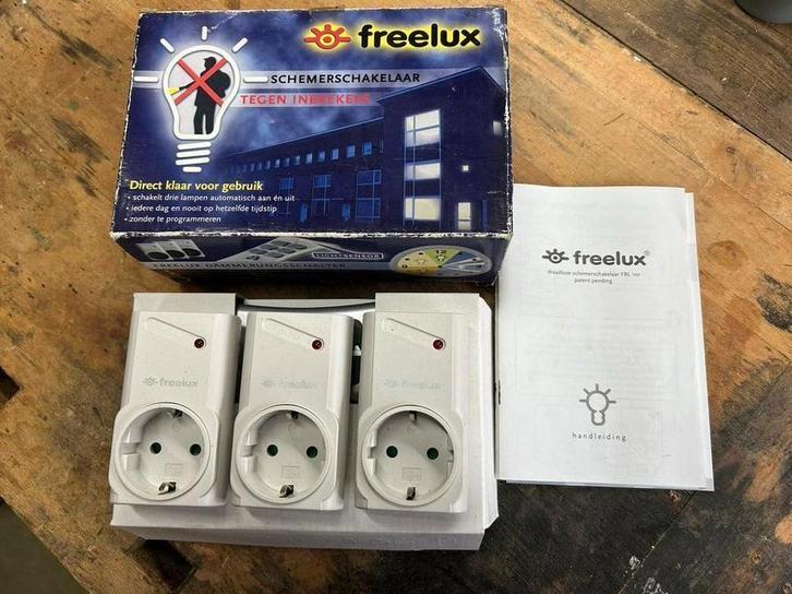 Freelux schemerschakelaar tegen inbrekers - nieuw, Detector, Sensor of Melder, Draadloos, Nieuw, Ophalen of Verzenden