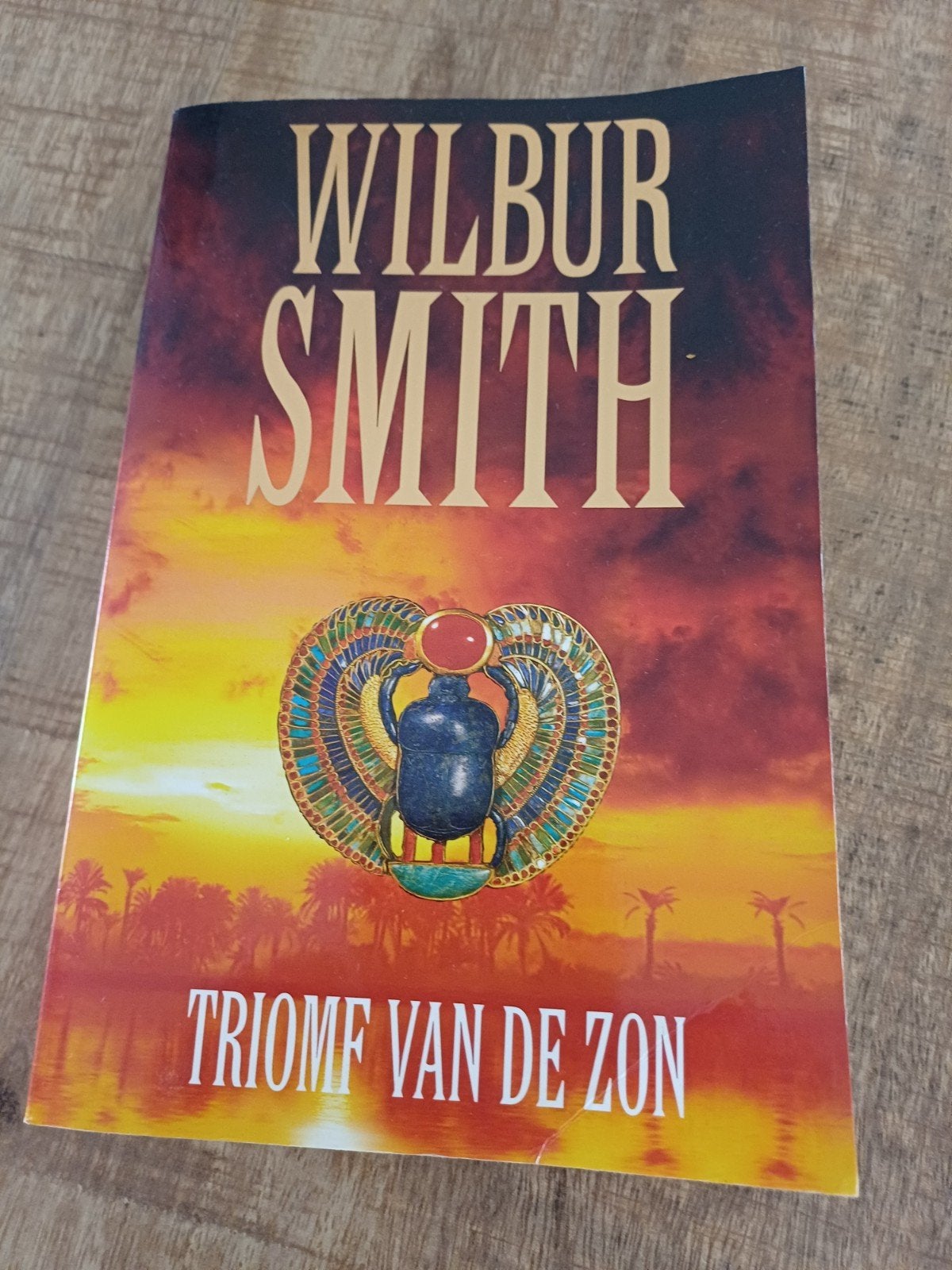 Wilbur Smith - Triomf van de zon, Ophalen of Verzenden, Gelezen, Wilbur Smith
