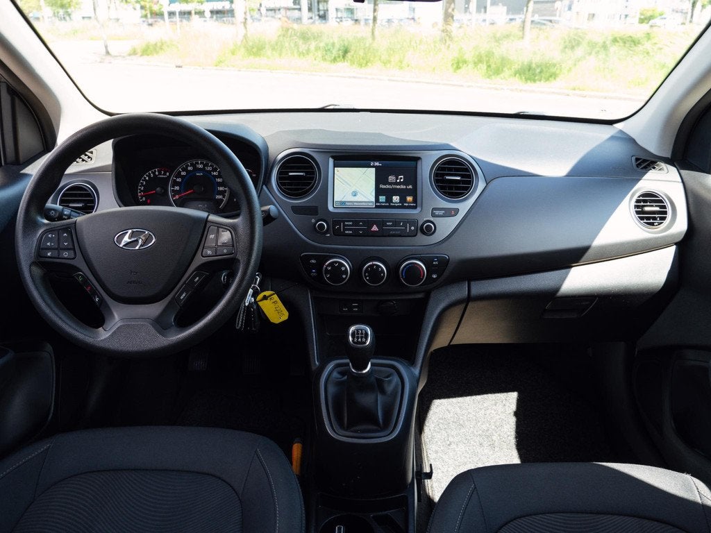 Hyundai i10 1.0i Comfort Orig NL|CarPlay|Cruise|Navi, Voorwielaandrijving, Euro 5, Stof, Gebruikt
