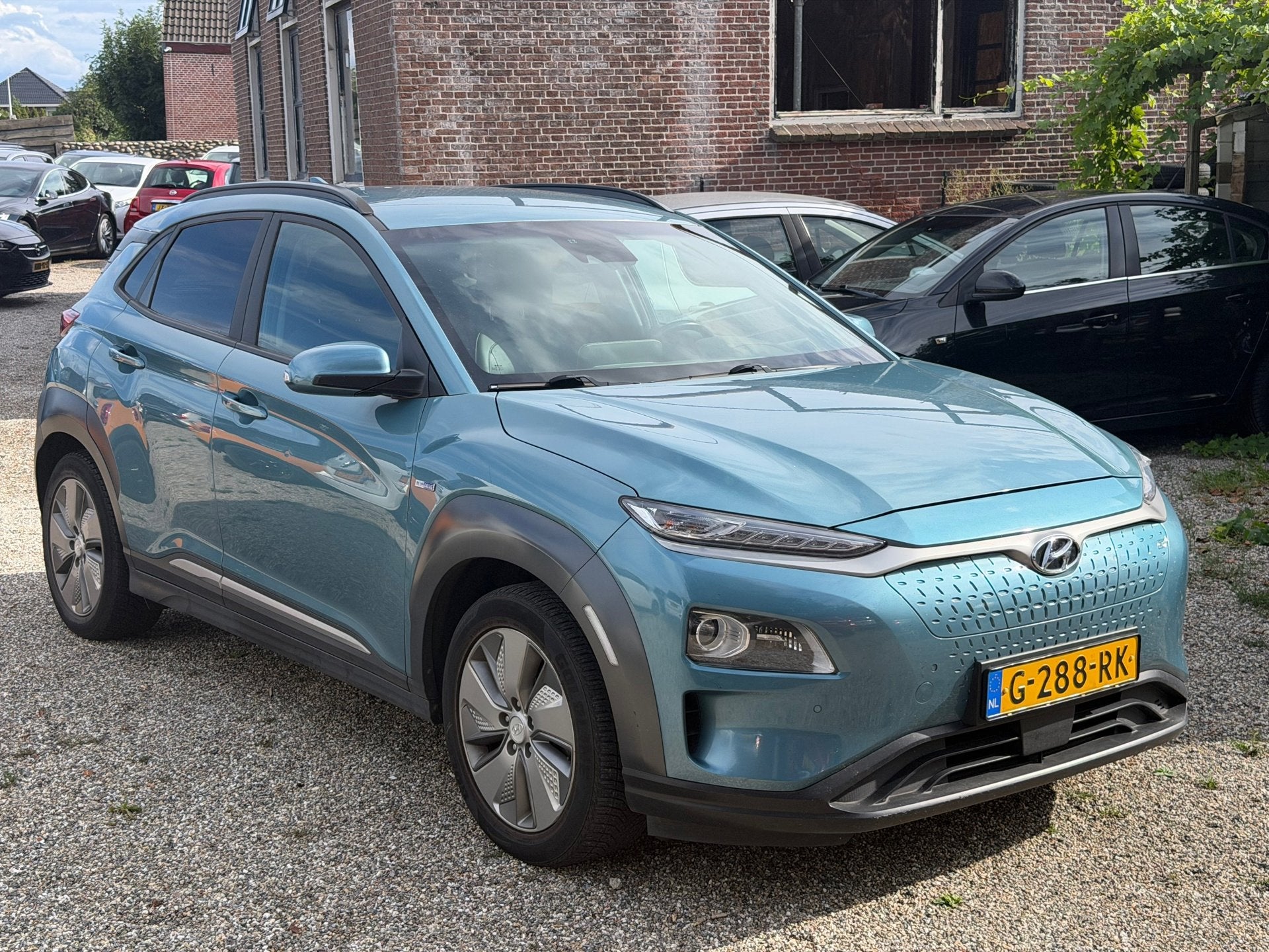Hyundai Kona EV Premium 64 kWh 450+ Bereik 3 Fase Bomvol Opt, Auto's, Hyundai, Dealer onderhouden, Gebruikt, Zwart, 174 min