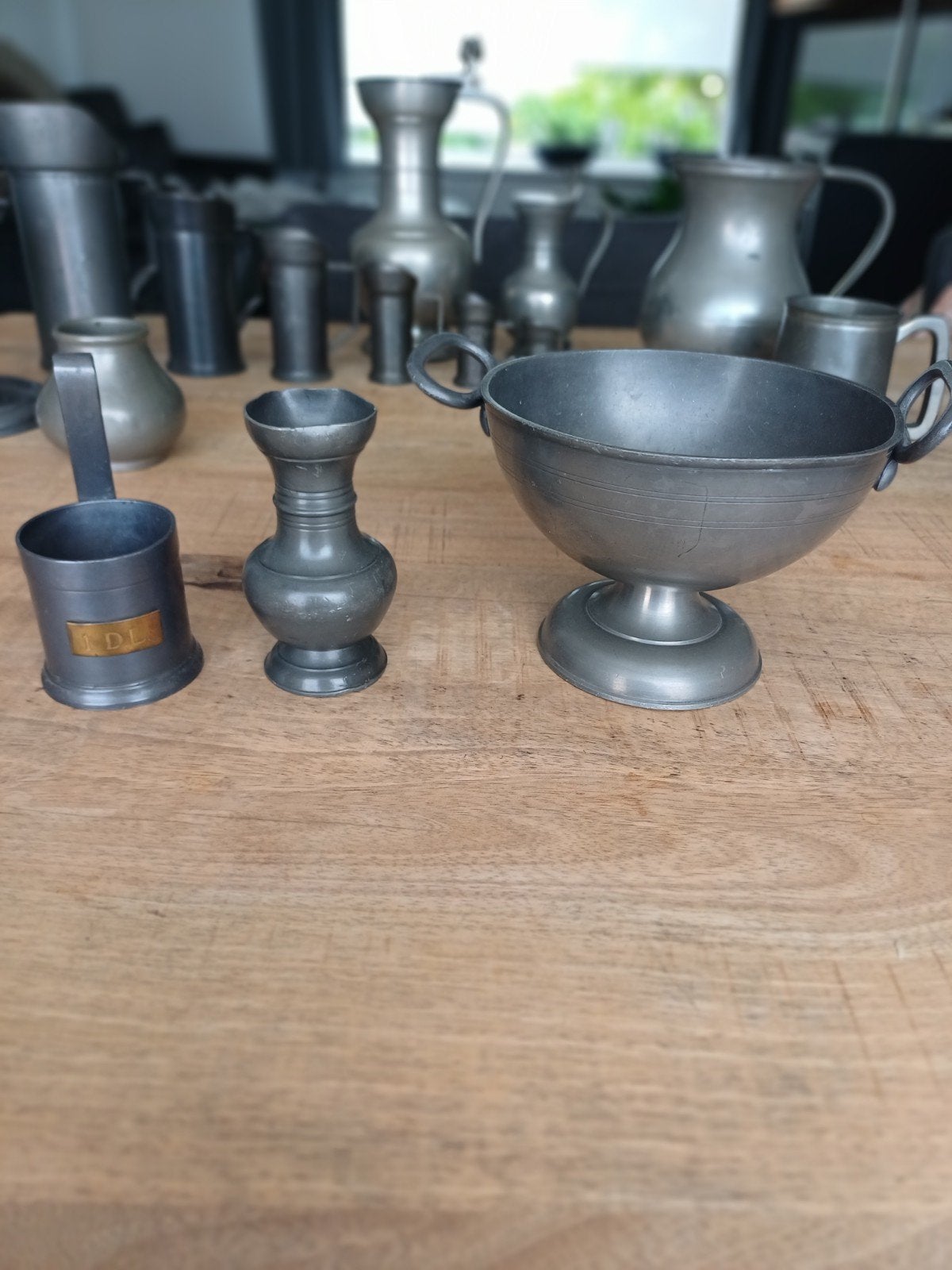 3 items van tin, Ophalen