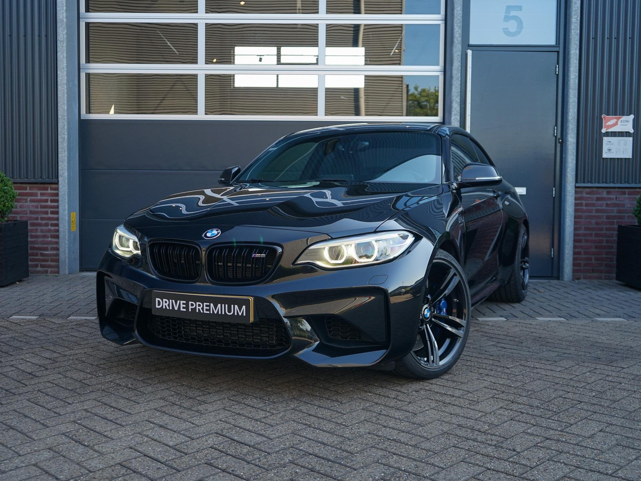 BMW 2-serie Coupé M2 DCT, Auto's, Gebruikt, Euro 6, 4 stoelen, Zwart