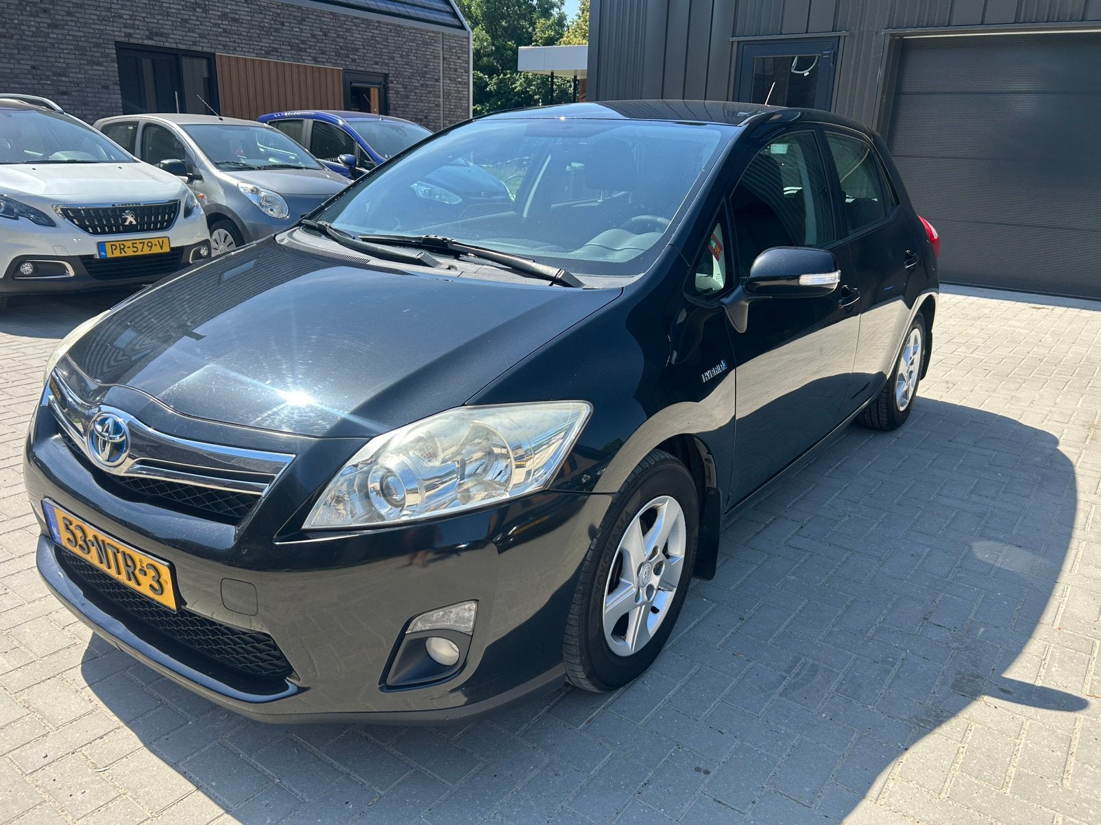 Toyota Auris 1.8 Full Hybrid 5DR CVT 2011 Zwart, Auto's, 4 cilinders, Zwart, Origineel Nederlands, Navigatiesysteem