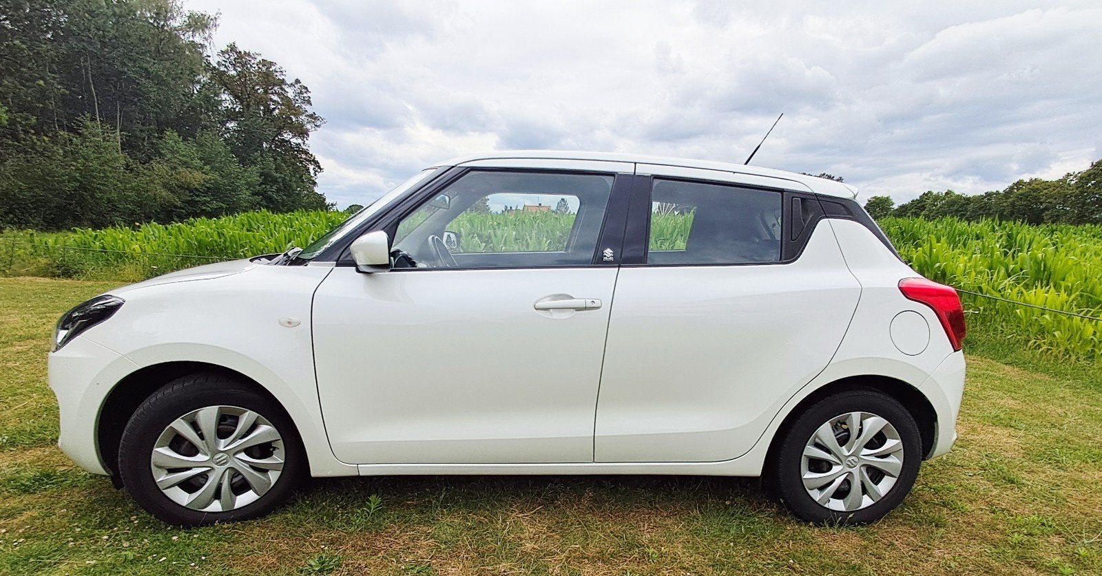 Suzuki Swift 1.2 Dualjet 83pk Smart Hybrid S&S 2021 Wit, Auto's, Suzuki, Voorwielaandrijving, 83 pk, Stof, 4 cilinders