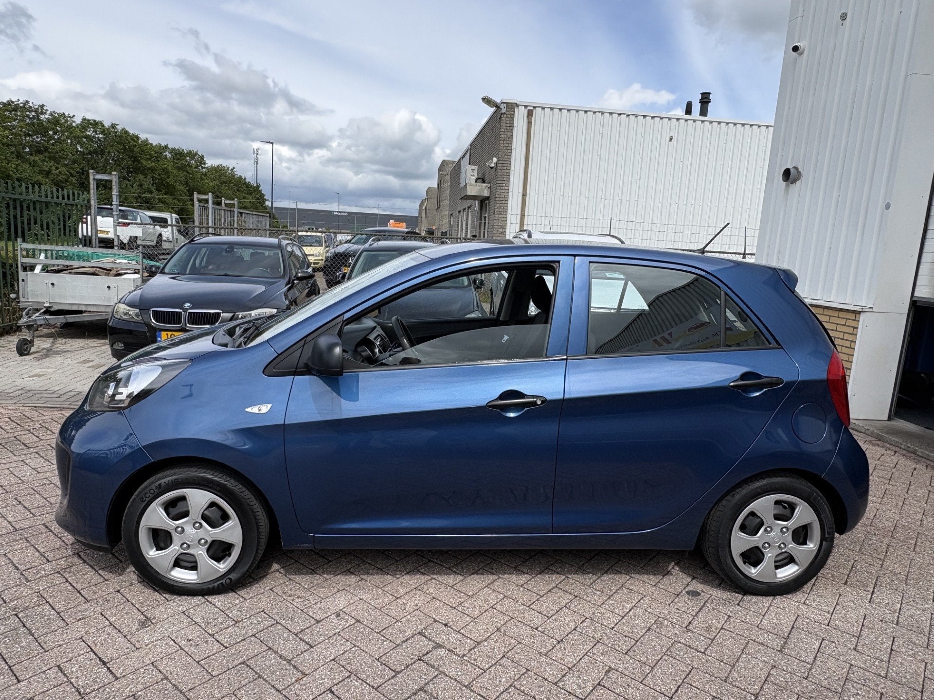 Kia Picanto 1.0 CVVT APK T/M 10-2-2027, Voorwielaandrijving, Stof, Gebruikt, Zwart