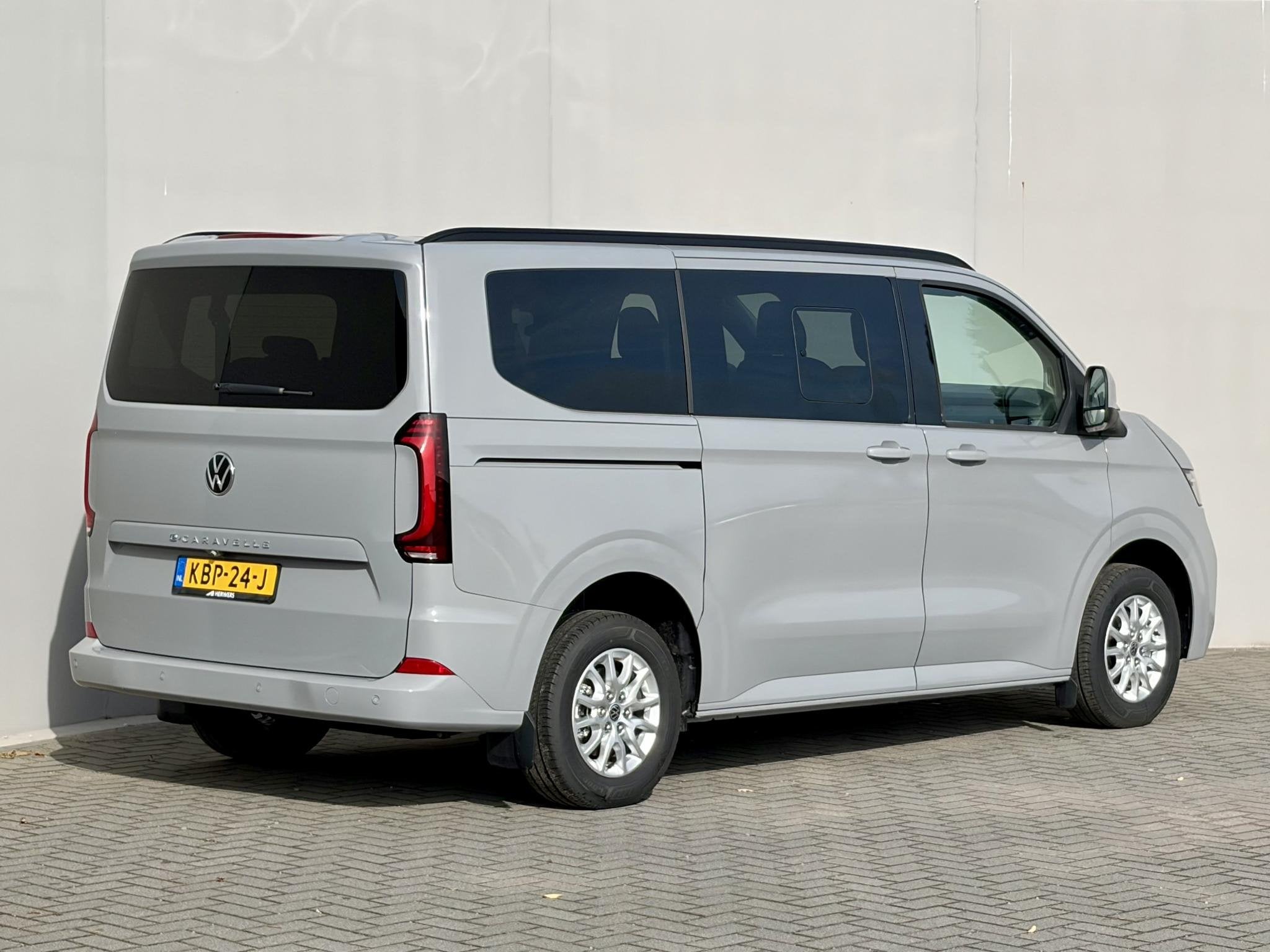 Volkswagen e-Transporter Caravelle 32 L1H1 Life 64 kWh Autom, Auto's, Automaat, Gebruikt, Overige carrosserieën, 2000 kg
