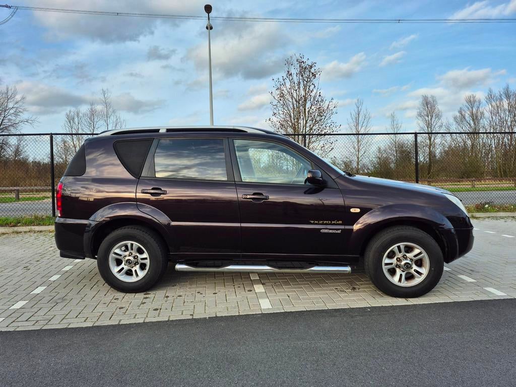 SsangYong Rexton RX 270 Xdi HR automaat, Auto's, Automaat, Gebruikt, Zwart, Stoelverwarming