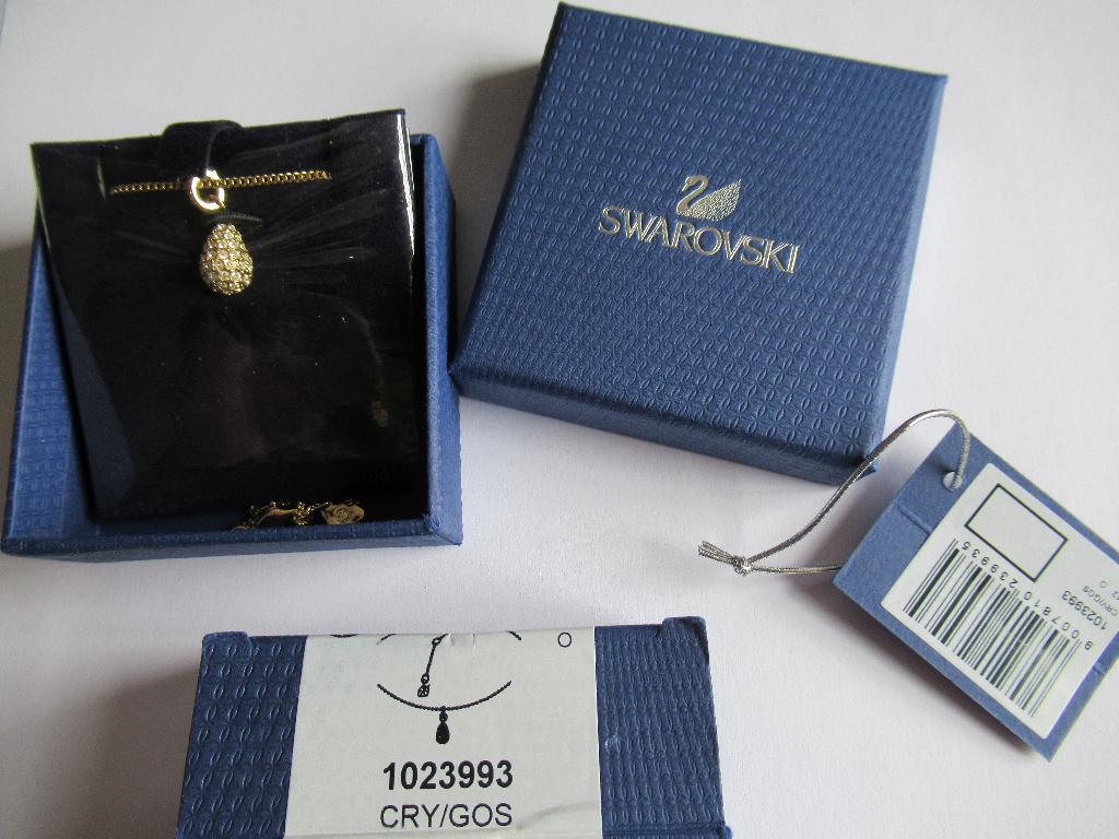 Swarovski ketting goudkleur met hangertje van een eikeltje, Verzamelen, Ophalen, Nieuw, Mode-accessoire