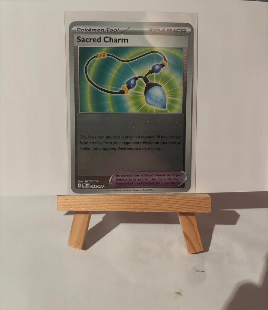 Pokemon sacred charm 093/094 PFL reverse holo, Ophalen of Verzenden, Nieuw, Losse kaart, Foil