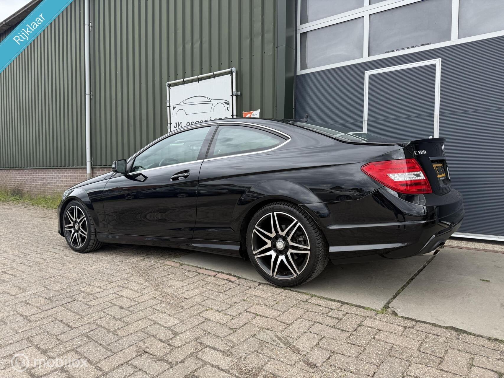 Mercedes C-klasse Coupé 180 AMG|Xenon|Navi|Cruise|F1 flippe, Automaat, Euro 5, Achterwielaandrijving, 4 stoelen