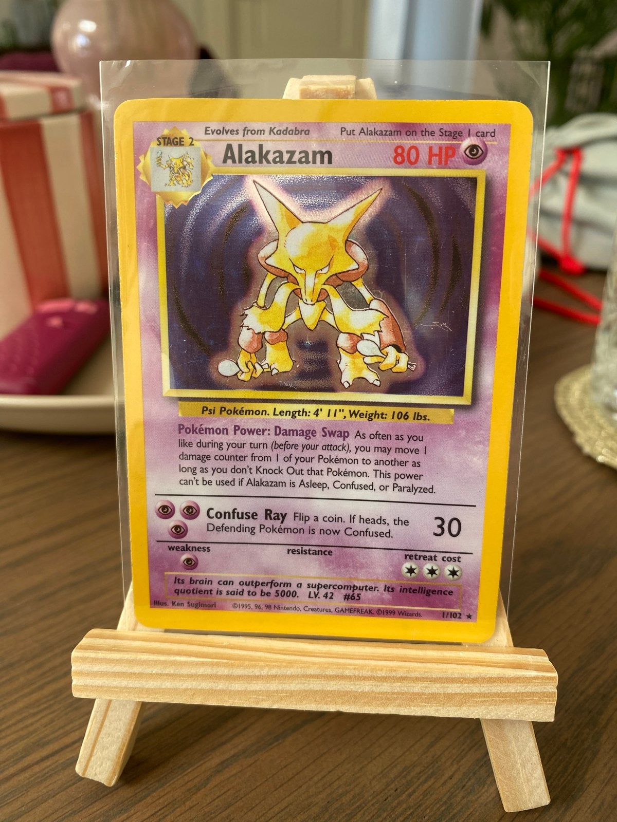 Alakazam 1/102 Pokémon kaart (Base Set Unlimited), Hobby en Vrije tijd, Ophalen of Verzenden, Zo goed als nieuw, Losse kaart