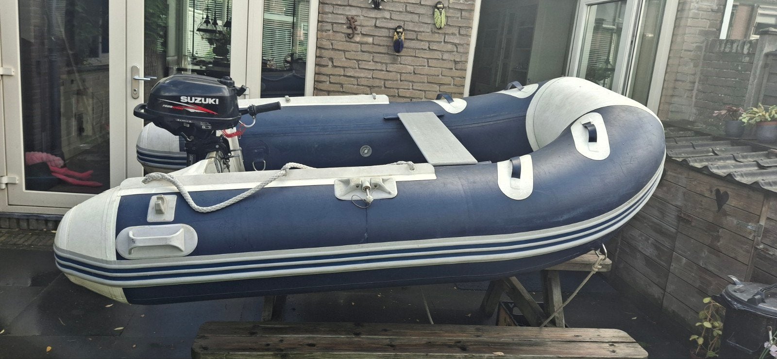 rubberboot met suzuki buitenboordmotor 2,5 pk, Gebruikt, Minder dan 15 m², Toebehoren, Ophalen