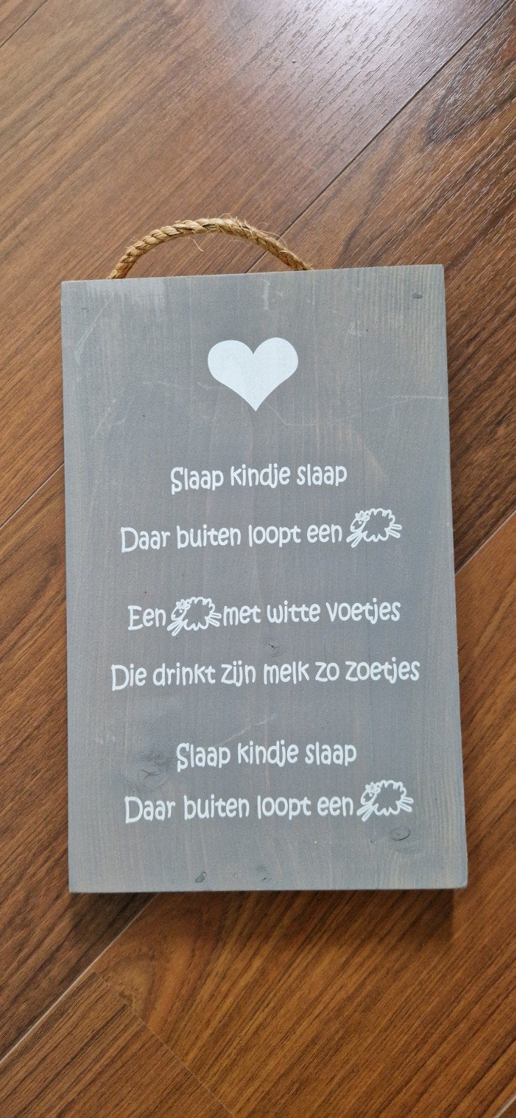 Houten bordje en houten giraffe, Ophalen