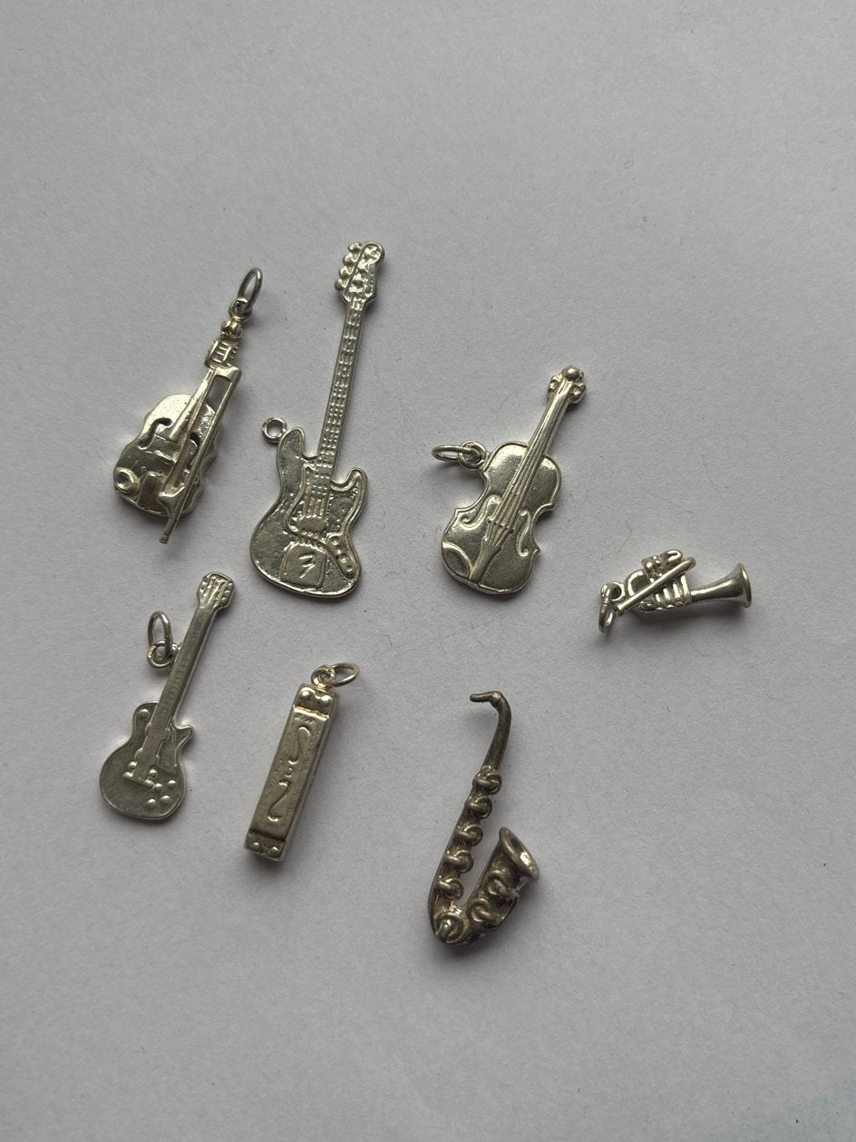 Zilveren bedels muziekinstrumenten (7 stuks) 0,925 zilver, Overige merken, Gebruikt, Ophalen of Verzenden, 4 bedels of meer
