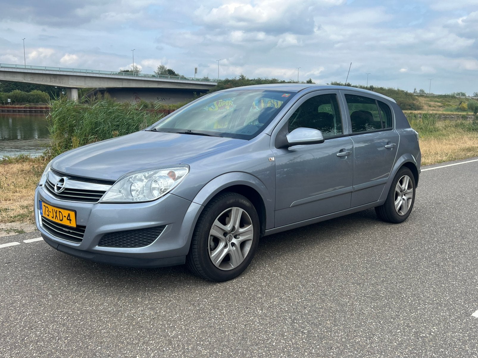 Opel Astra 1.6 16V 5D 85KW 2009 Grijs, Voorwielaandrijving, 15 km/l, 4 cilinders, Parkeersensor