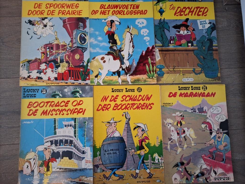 7 x Lucky Luke jaren '60., Meerdere stripboeken, Ophalen of Verzenden, Gelezen