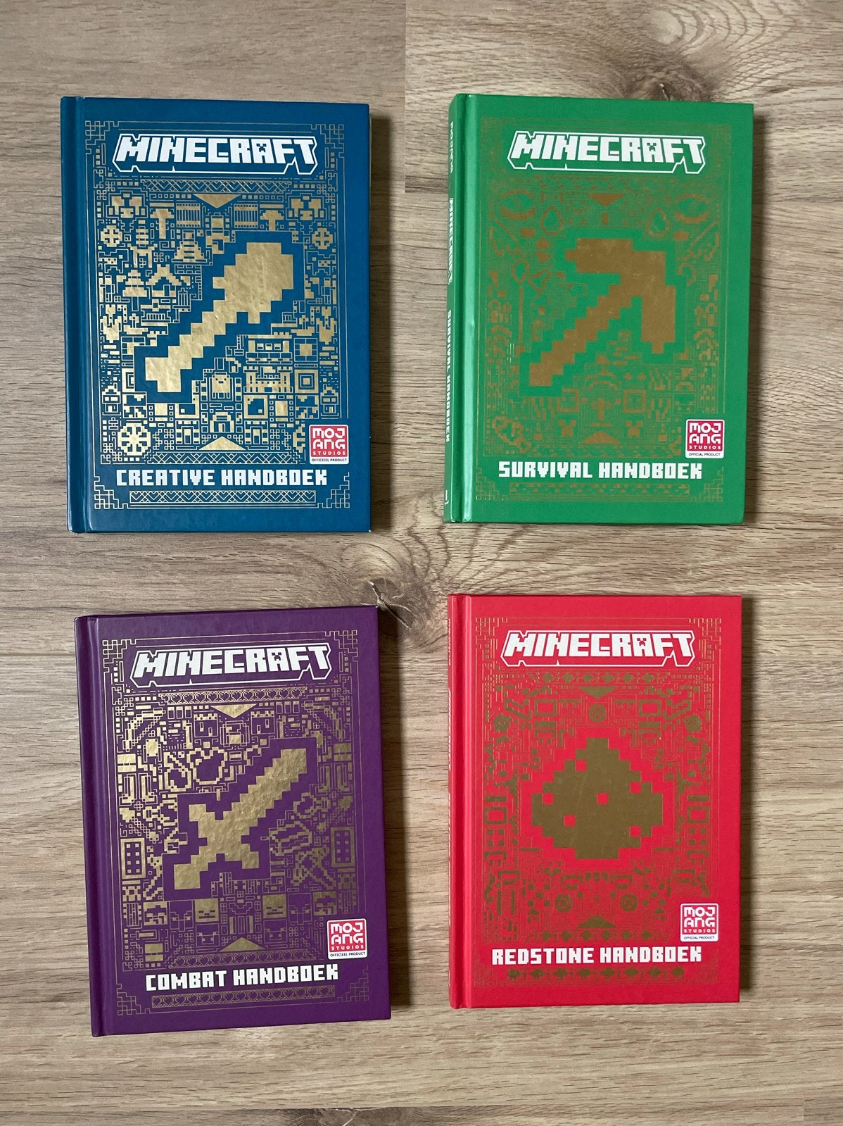 Minecraft Handboeken Set - Combat, Creative, Redstone, Survi, Boeken, Ophalen of Verzenden, Zo goed als nieuw