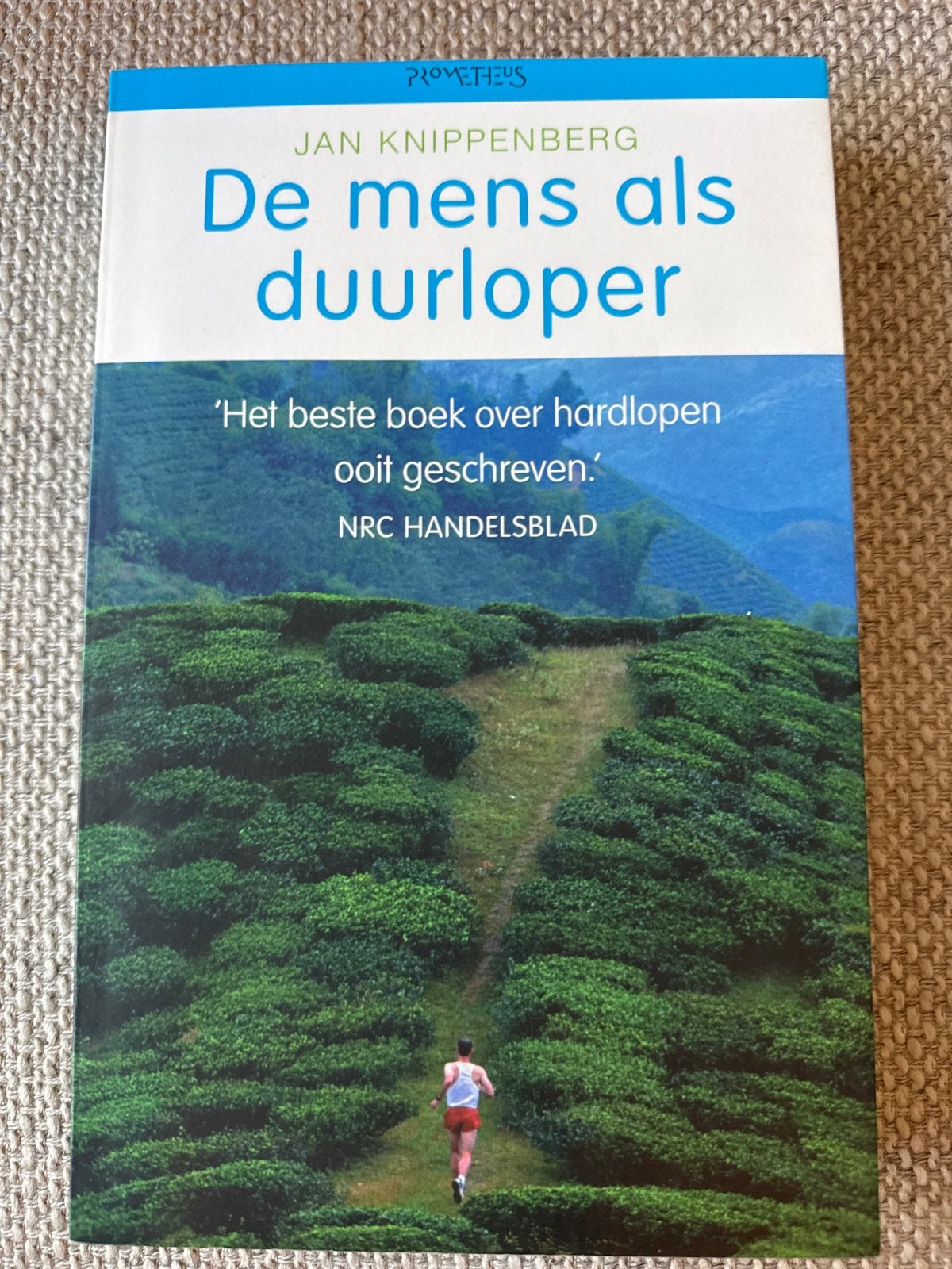 De mens als duurloper - Jan Knippenberg (Hardlopen), Ophalen of Verzenden, Gelezen, Lopen en Fietsen