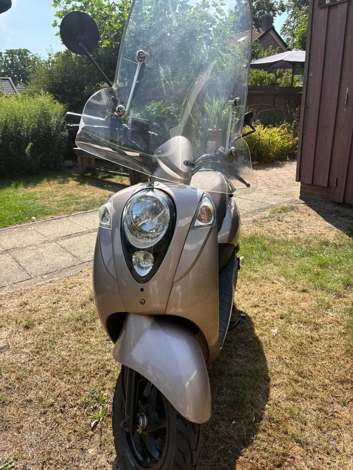 Sym mio, Ophalen, Zo goed als nieuw, Benzine, Mio