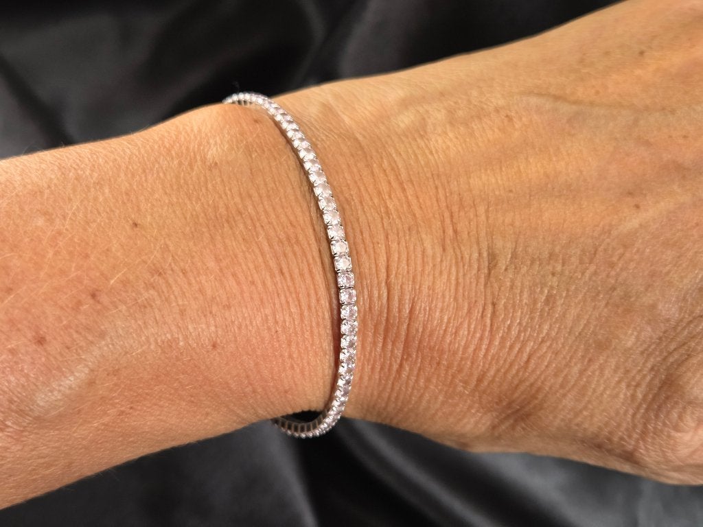 Zilveren stretch bracelet rozekwarts zirkonia's. 2026/521, Overige kleuren, ., Nieuw, Ophalen of Verzenden