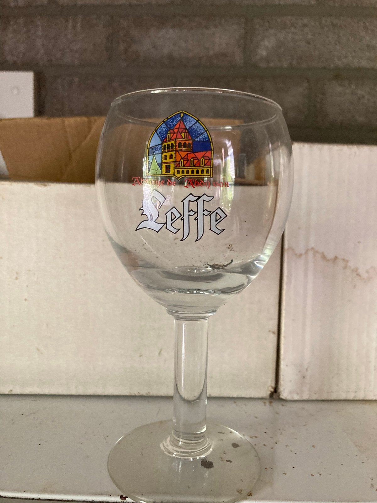 4 Leffe bierglazen op voet - 25cl, Huis en Inrichting, Ophalen, Glas of Glazen, Gebruikt, Overige merken