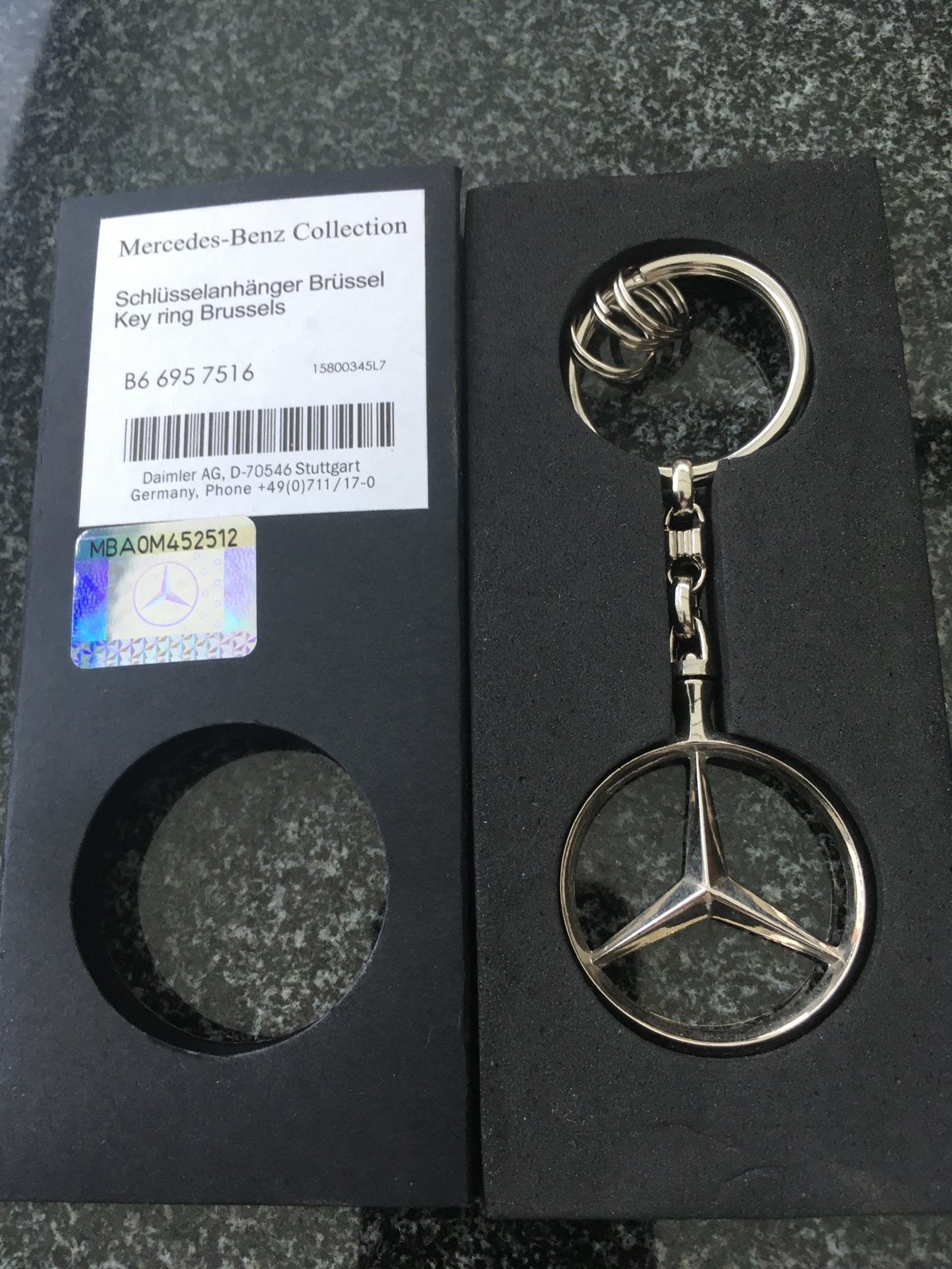 Mercedes sleutelhanger model Brussel, Ophalen of Verzenden, Nieuw, Merk
