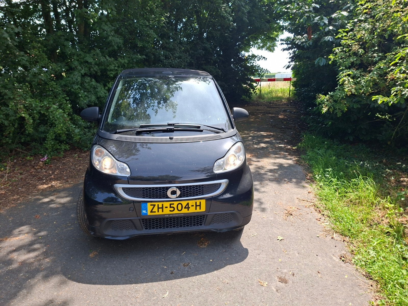 Smart ForTwo 1.0 52KW Cabrio MHD AUT 2012 Zwart, Auto's, Automaat, Zwart, 755 kg, Start-stop-systeem