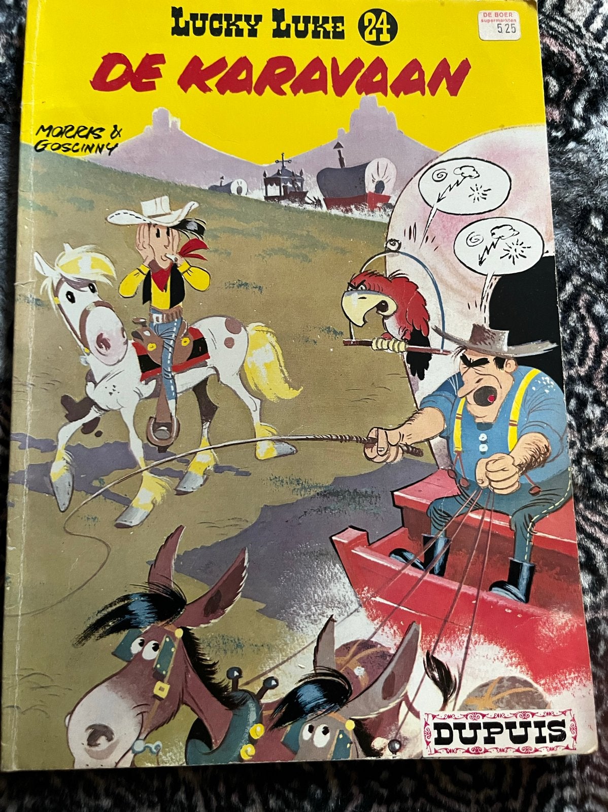 Lucky Luke 24: De Karavaan - Morris & Goscinny, Boeken, Eén stripboek, Ophalen, Gelezen