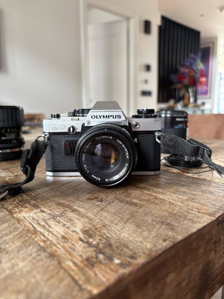 Olympus OM10 inclusief 3 lenzen, Ophalen of Verzenden, Gebruikt, Spiegelreflex, Olympus