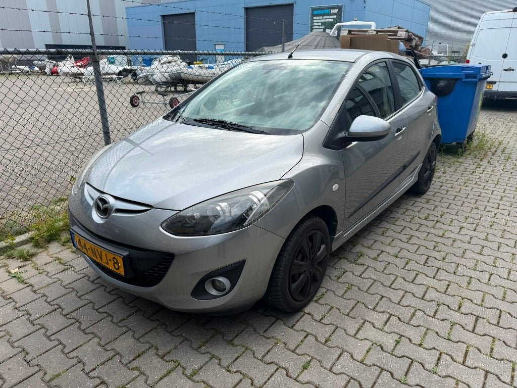 Mazda 2 1.5 75KW 5-DRS 2011 Grijs, Stof, 1498 cc, 4 cilinders, Handgeschakeld
