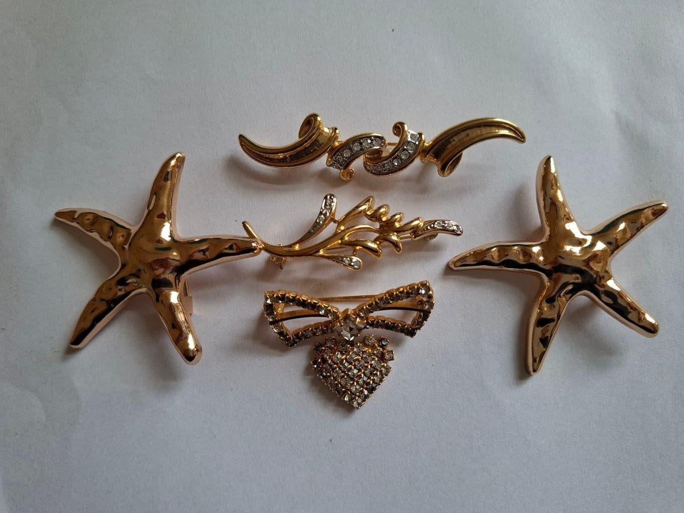 Set van 5 gouden broches met strass en kristal, 4 tot 7 cm, Gebruikt, Met kristal, Ophalen of Verzenden