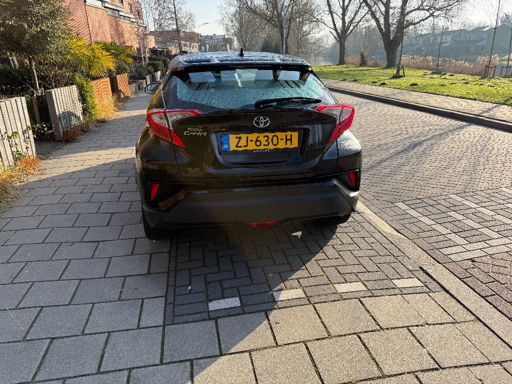 Toyota C-HR 1.2 2019 DEALER ONDERHOUDEN, 1 jaar garantie!, Auto's, Toyota, Voorwielaandrijving, 15 km/l, 4 cilinders, Zwart