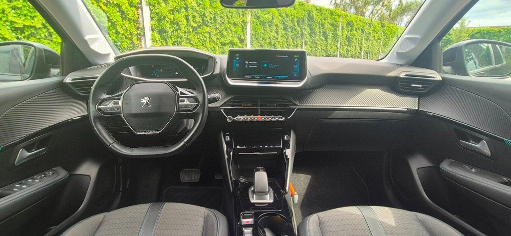 Peugeot E-208 EV Allure Pack | 11 KW 3 FASE LADEN | WARMTEPO, Auto's, Peugeot, 136 pk, Gebruikt, Leder en Stof, Zwart