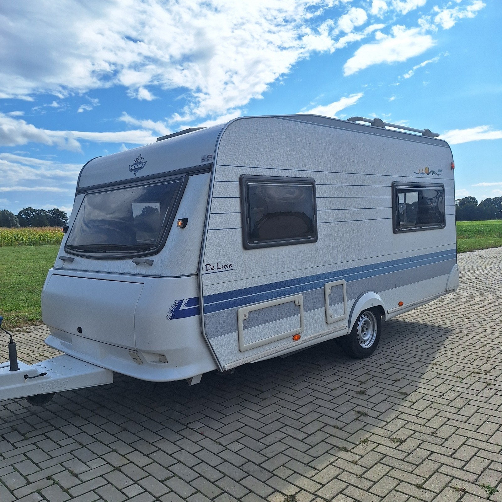 Hobby de Luxe 440, Voortent+Luifel, Vast bed, Fietsendrager, Caravans en Kamperen, Hobby, Treinzit, Schokbreker, 4 tot 5 meter