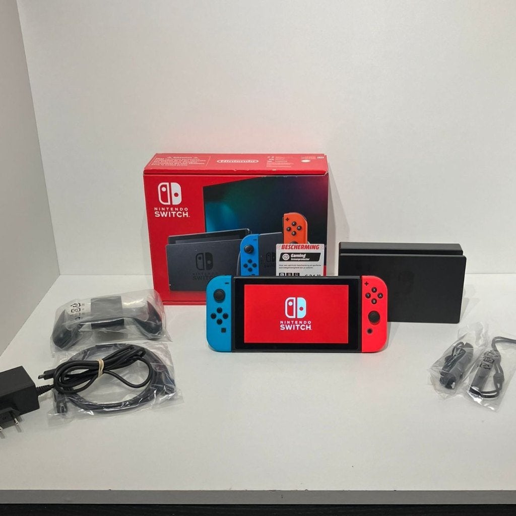Nintendo Switch V2 2019 Rood/Blauw ZGAN Compleet in Doos, Ophalen of Verzenden, Zo goed als nieuw, Met 2 controllers, Switch 2019 Upgrade