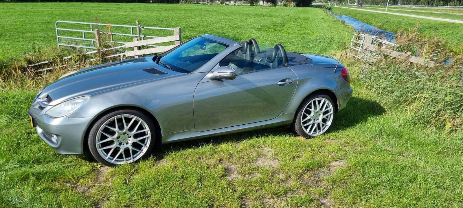 Mercedes-Benz SLK 1.8 Slk200 Kompr Roadster AUT 2009 Grijs, Auto's, Achterwielaandrijving, Zwart, 4 cilinders, Cabriolet