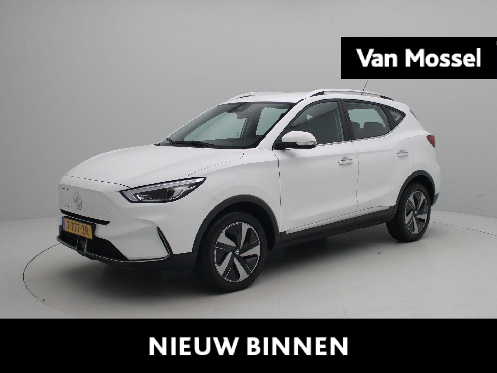 MG ZS EV Long Range Comfort 70 kWh, Auto's, 12 maanden, Stof, ZS, Wit