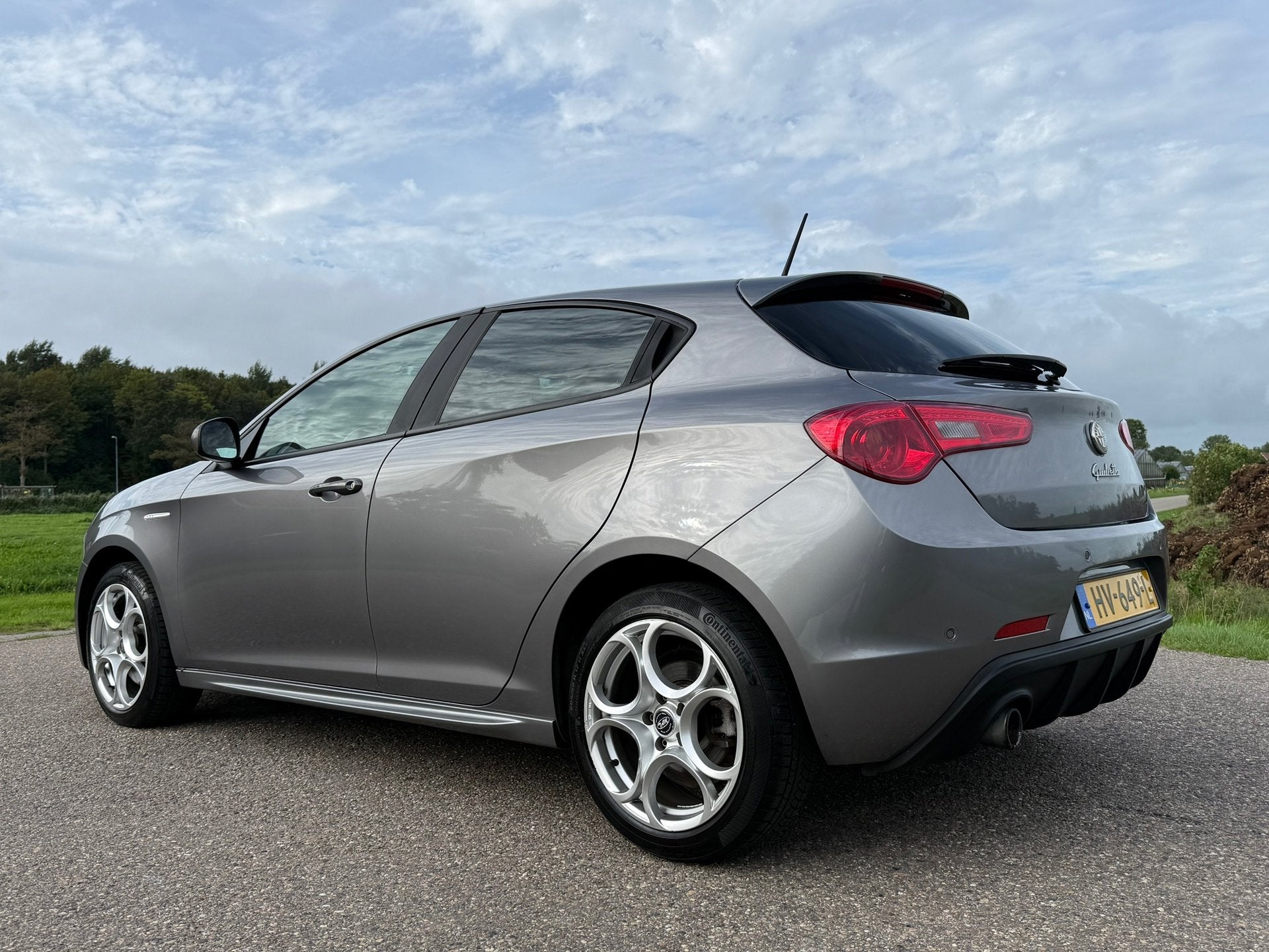 Alfa Romeo Giulietta 1.4 T Sprint Automaat | 1e Eigenaar | N, Auto's, Dealer onderhouden, 4 cilinders, Alcantara, Origineel Nederlands