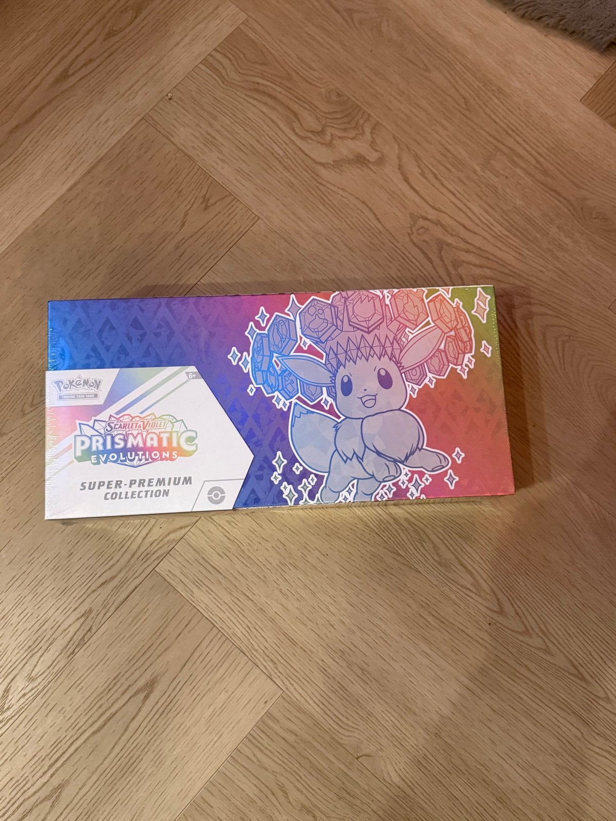 Pokémon Prismatic Evolutions Super Premium Collectie, Ophalen of Verzenden, Nieuw, Overige typen