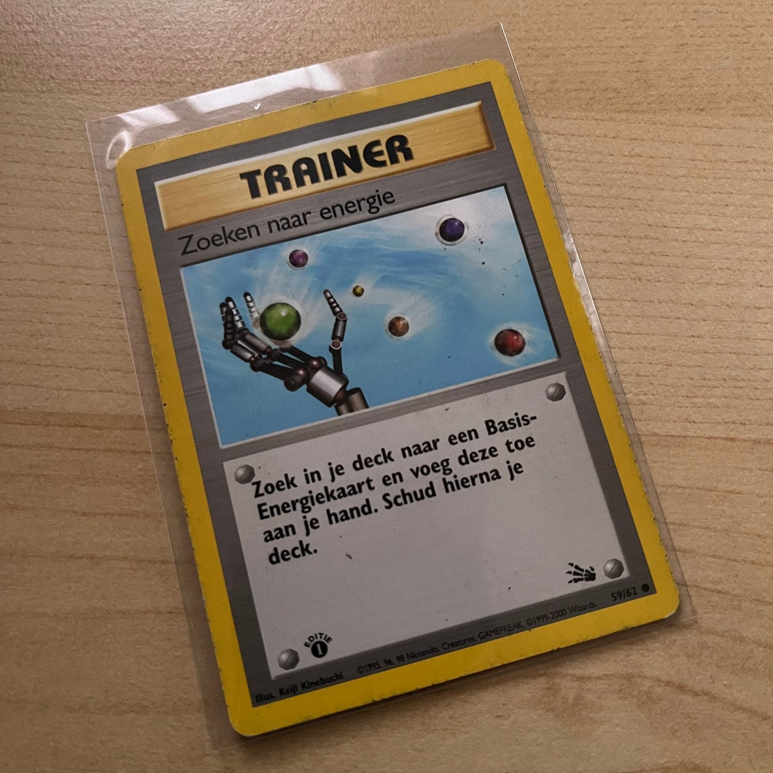 Zoeken naar energie 1st edition - Fossil, Hobby en Vrije tijd, Verzamelkaartspellen | Pokémon, Ophalen of Verzenden, Zo goed als nieuw