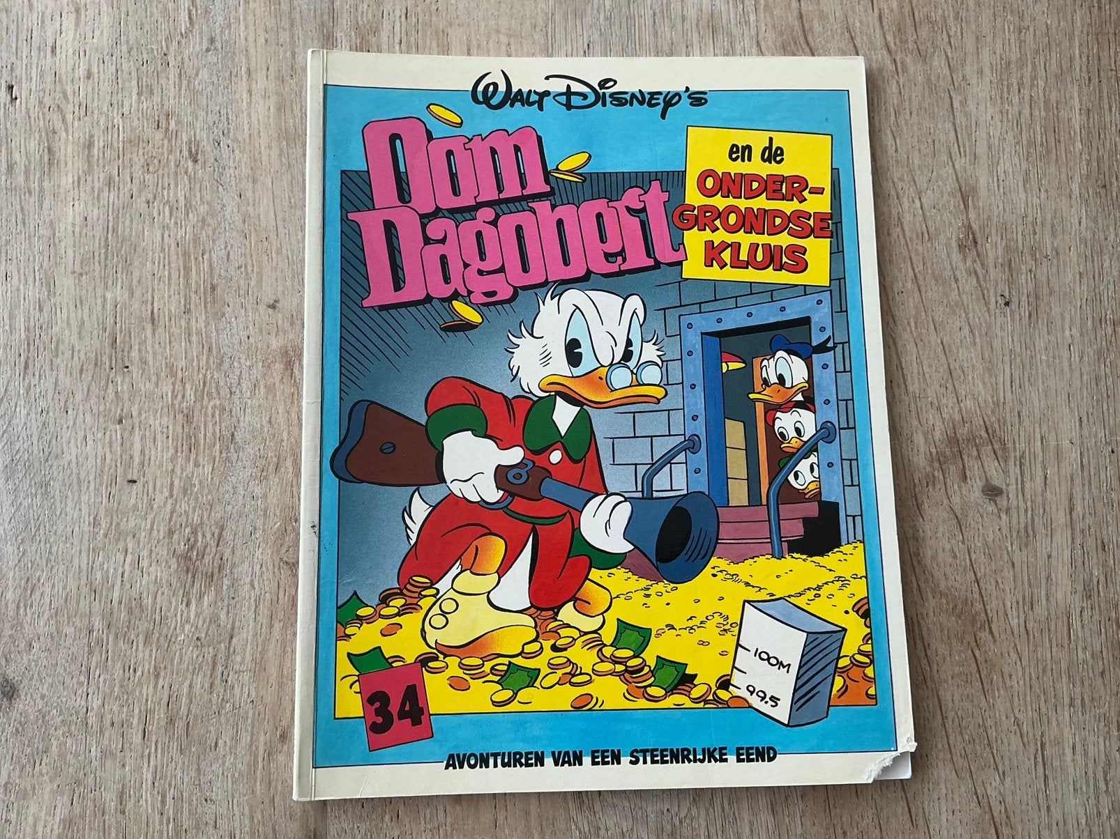 Album Oom Dagobert en de ondergrondse kluis 34 - 1e druk, Boeken, Eén comic, Ophalen of Verzenden, Gelezen, Europa