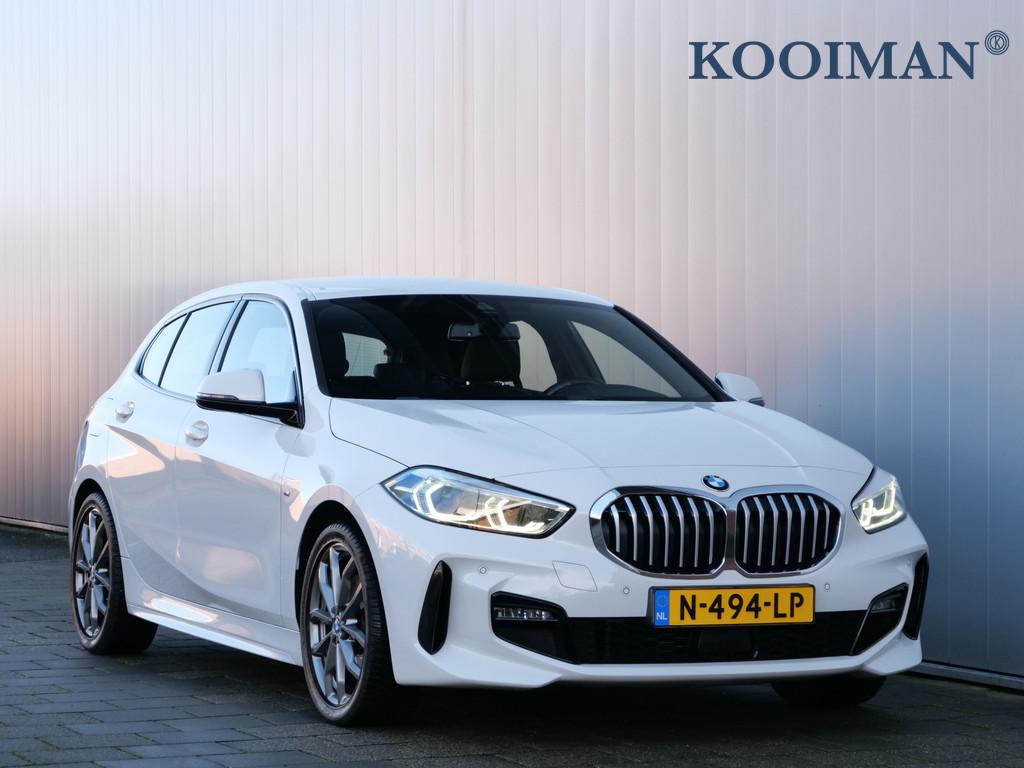 BMW 1-serie 118i High Executive 136 Pk Automaat Navi / Apple, Auto's, BMW, 136 pk, Gebruikt, Leder en Stof, Wit