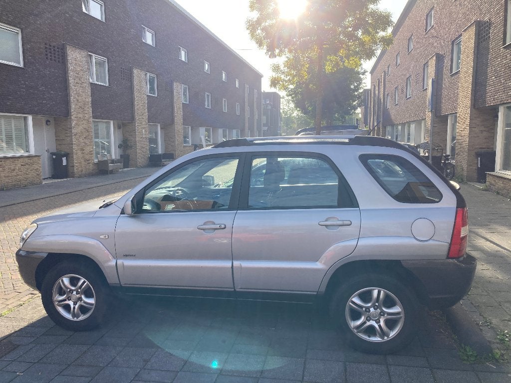 Kia Sportage 2.0 16V 4WD | Benzine | 2007 | 207.183 km, Voorwielaandrijving, Zwart, 4 cilinders, Leder en Stof