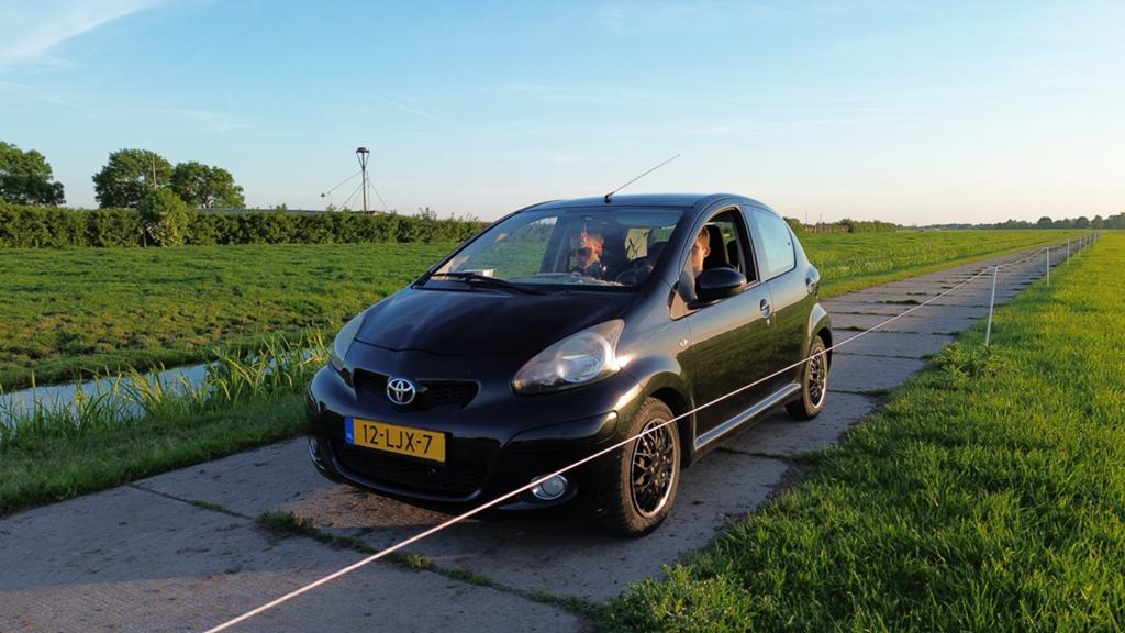 Toyota Aygo 5DRS 2010 Zwart, Auto's, Voorwielaandrijving, 4 stoelen, Origineel Nederlands, Handgeschakeld
